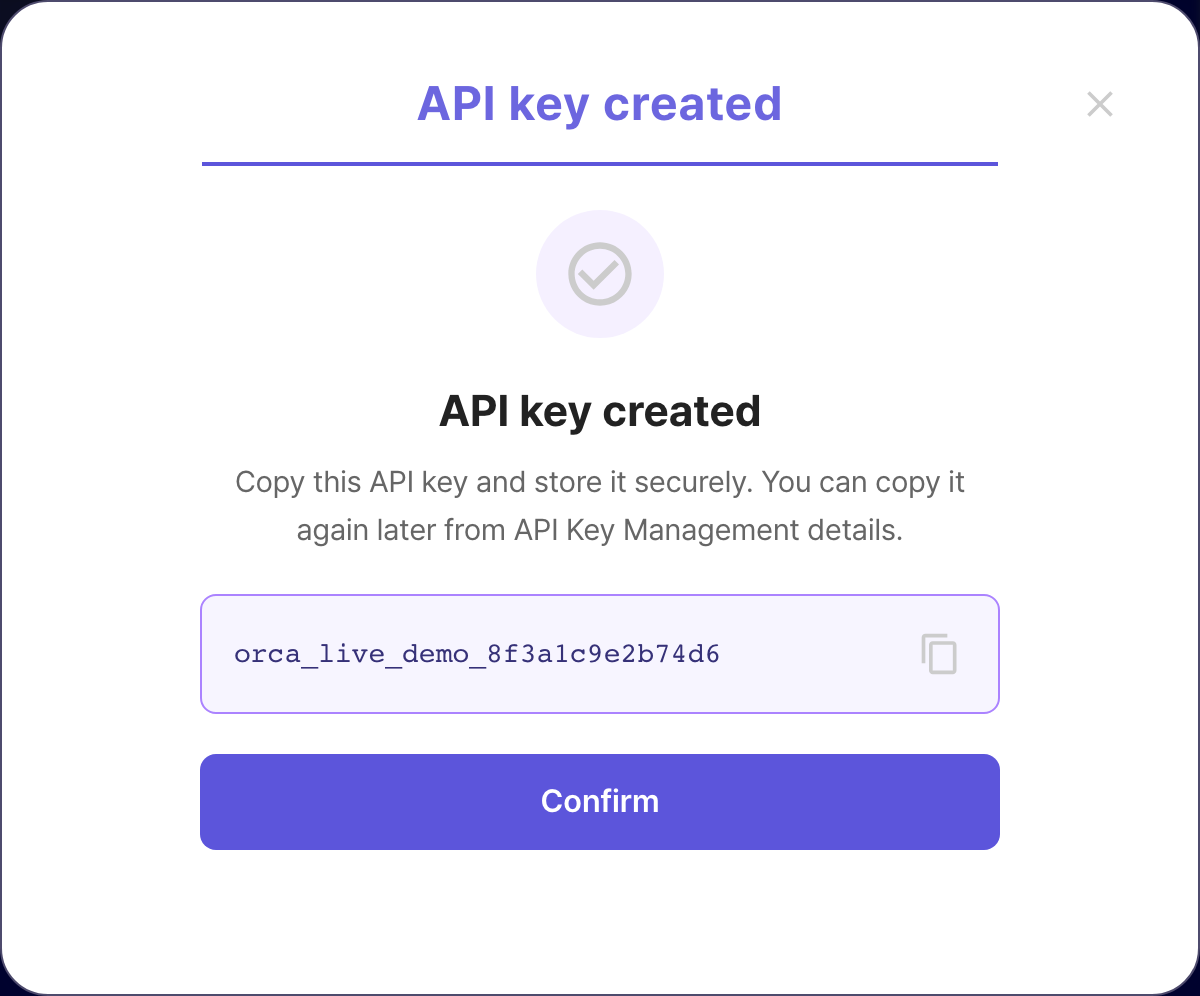 ORCA API key created modal showing the plaintext key with a copy button